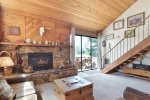 Mammoth Rental Snowflower 15 - Living Room has a Woodstove